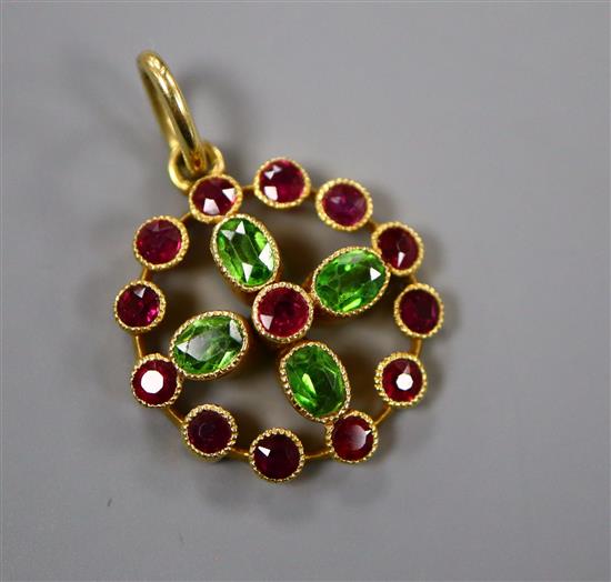 An early-mid 20th century yellow metal demantoid garnet and ruby cluster set openwork pendant, 16mm.